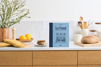 French cookbook, Le Fond: Lessons from a Neighborhood Bistro, in kitchen.